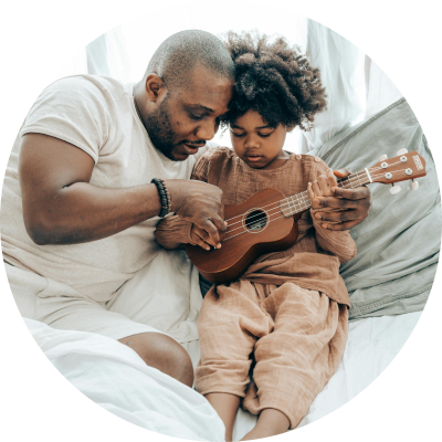 Man with daughter and guitar